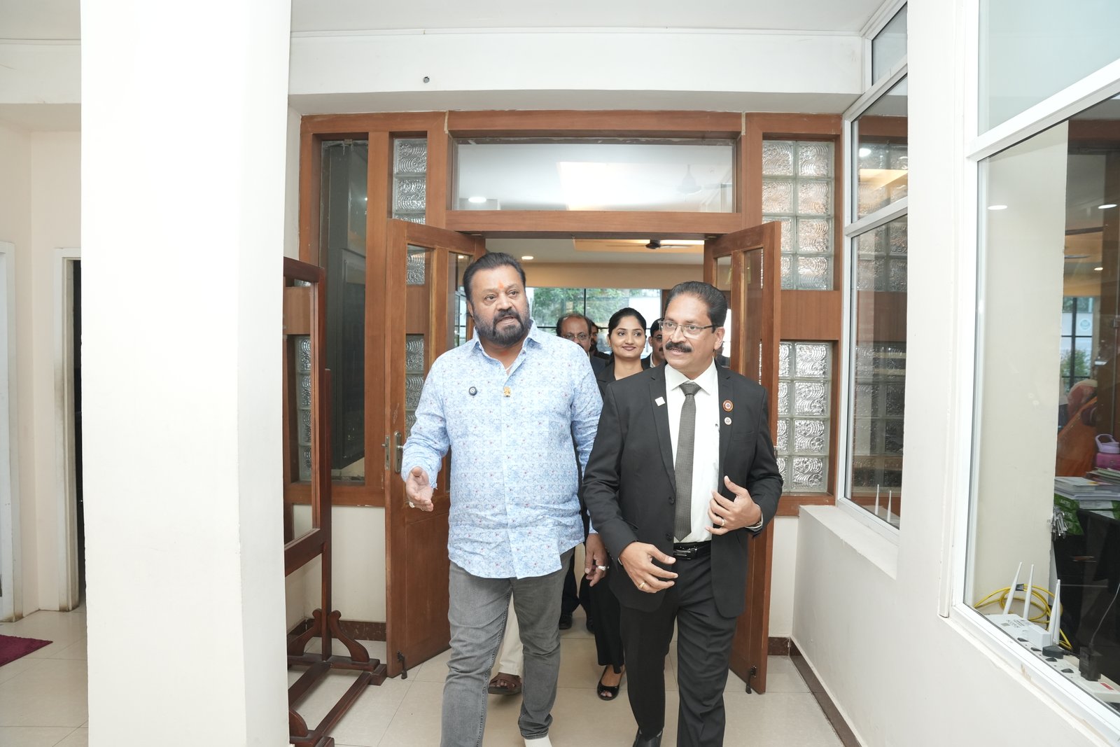 HONOURING CA.SREEKUMAR BY Shri SURESH GOPI M P