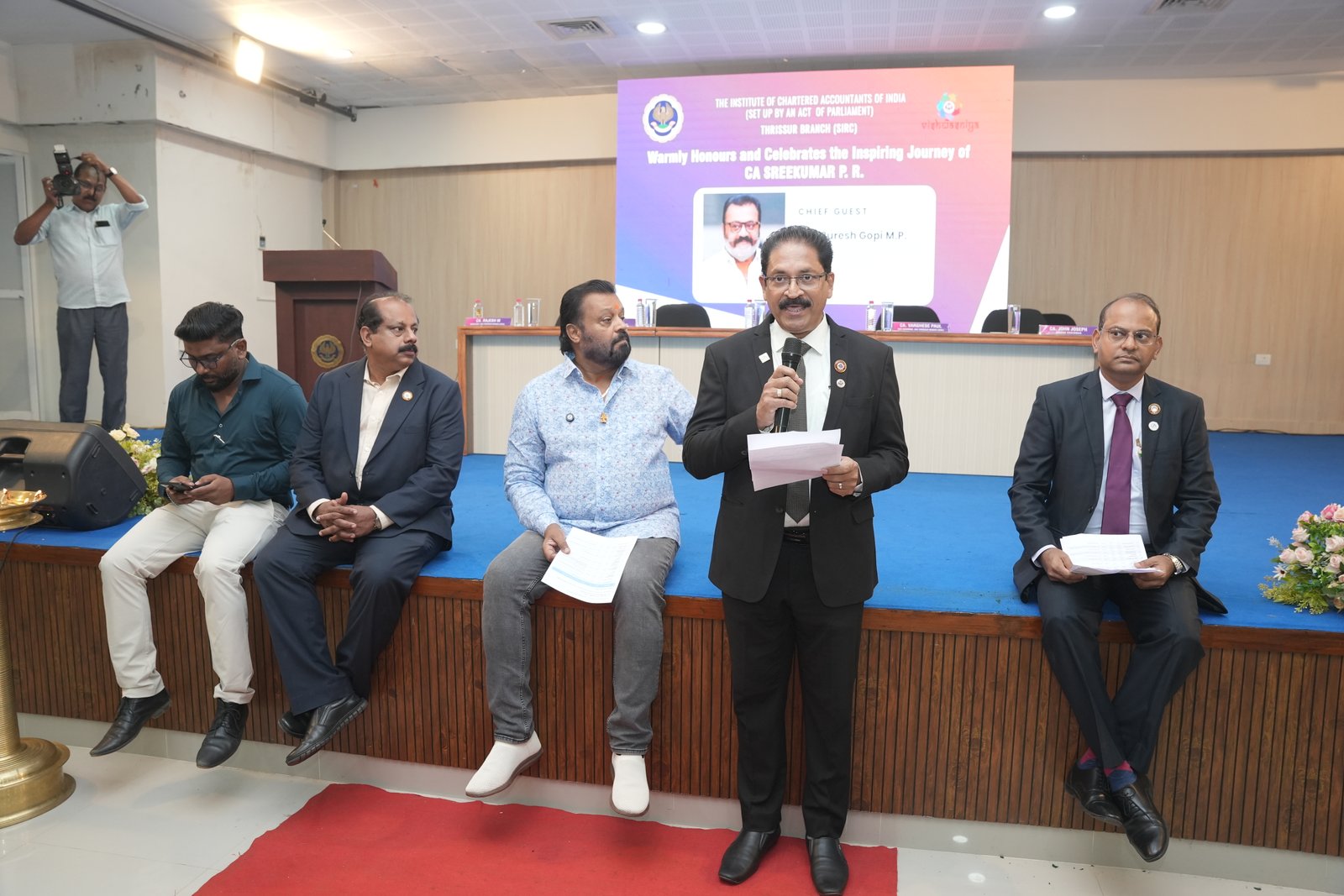 HONOURING CA.SREEKUMAR BY Shri SURESH GOPI M P