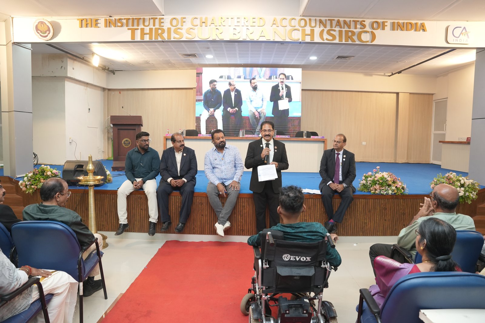 HONOURING CA.SREEKUMAR BY Shri SURESH GOPI M P