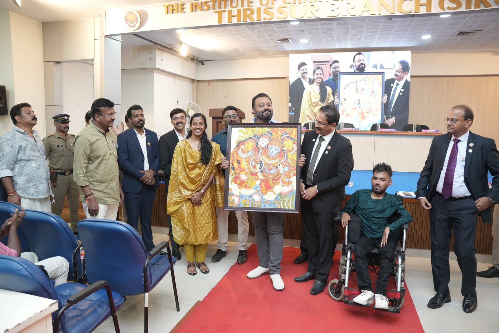 HONOURING CA.SREEKUMAR BY Shri SURESH GOPI M P