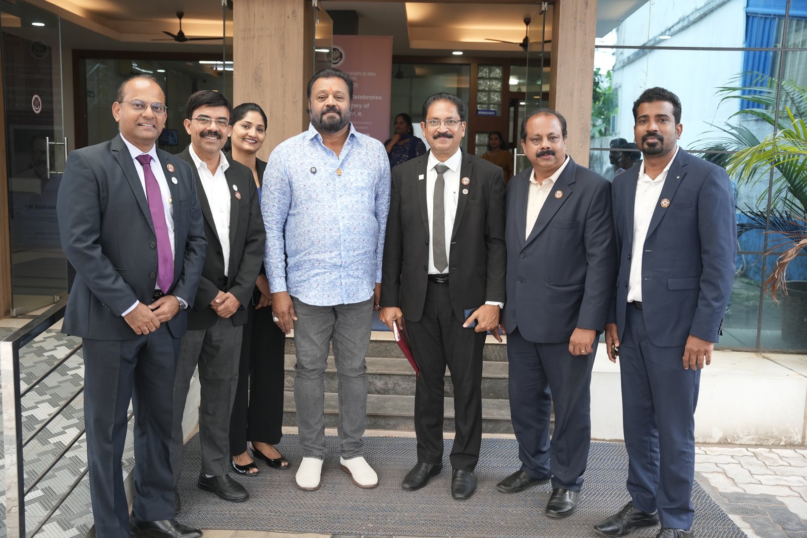 HONOURING CA.SREEKUMAR BY Shri SURESH GOPI M P